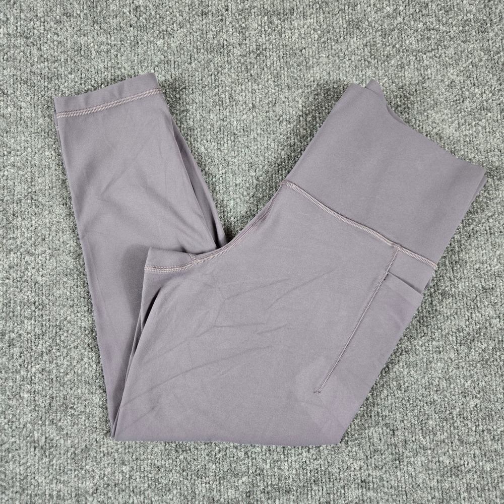 Athleta Salutation Stash 7/8 Tight Leggings Womens Medium Petite Purple Pockets